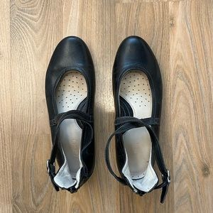 Black leather flats